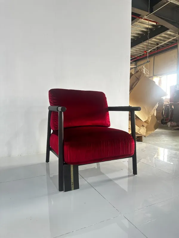 Red upholstered hotel lounge chair before packing